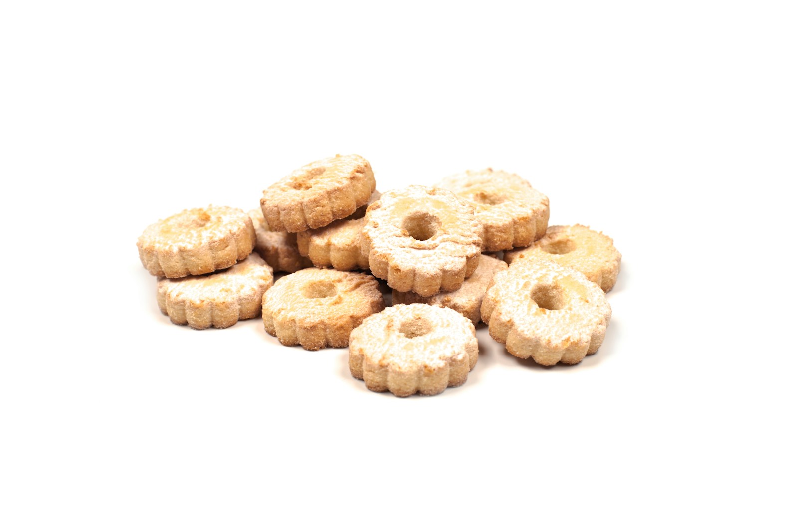 A pile of donuts sitting on top of a white table